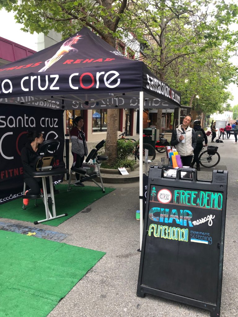 wellness consultant zoe welcoming people to santa cruz core on spring bike to work day downtown santa cruz 