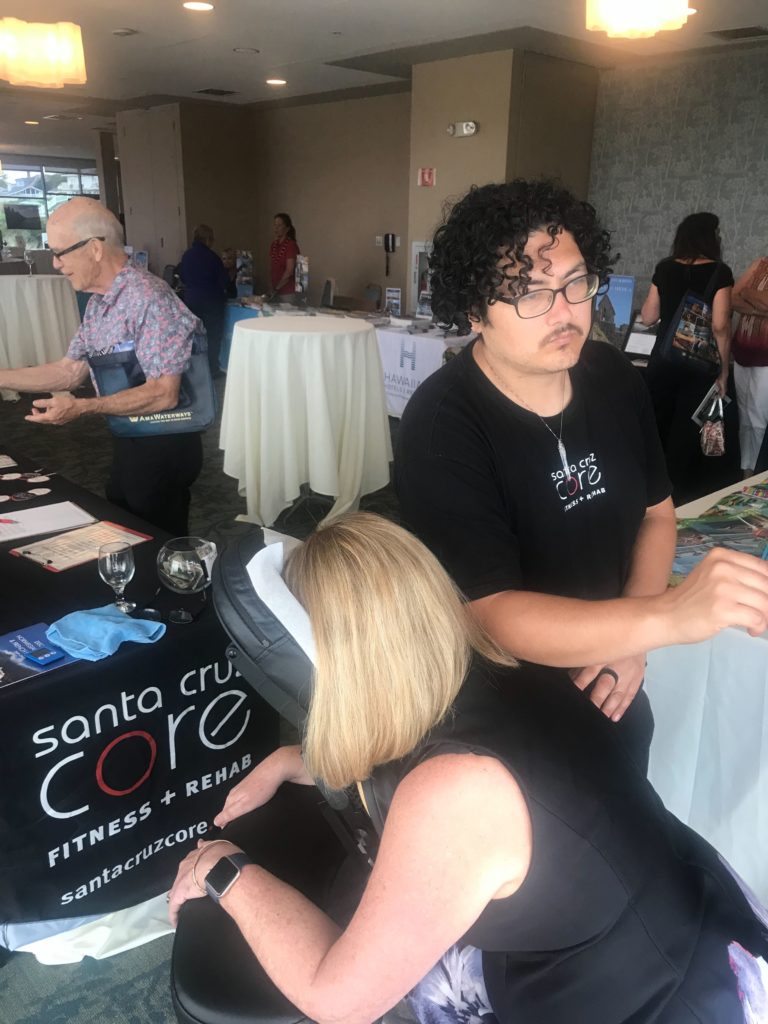 santa cruz core massage therapist offering free demos at dream inn event